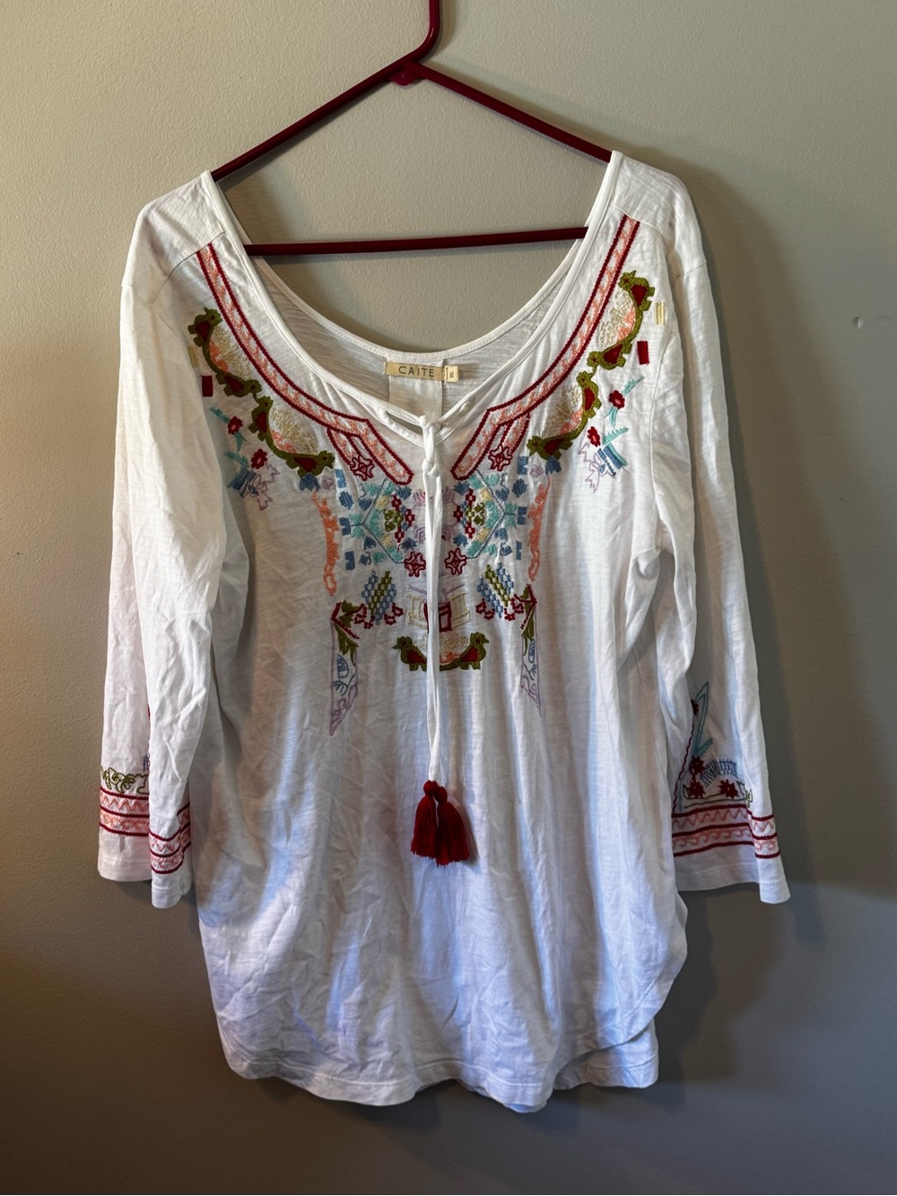 CAbi White Embroidered Peasant Tunic with Red Tassel